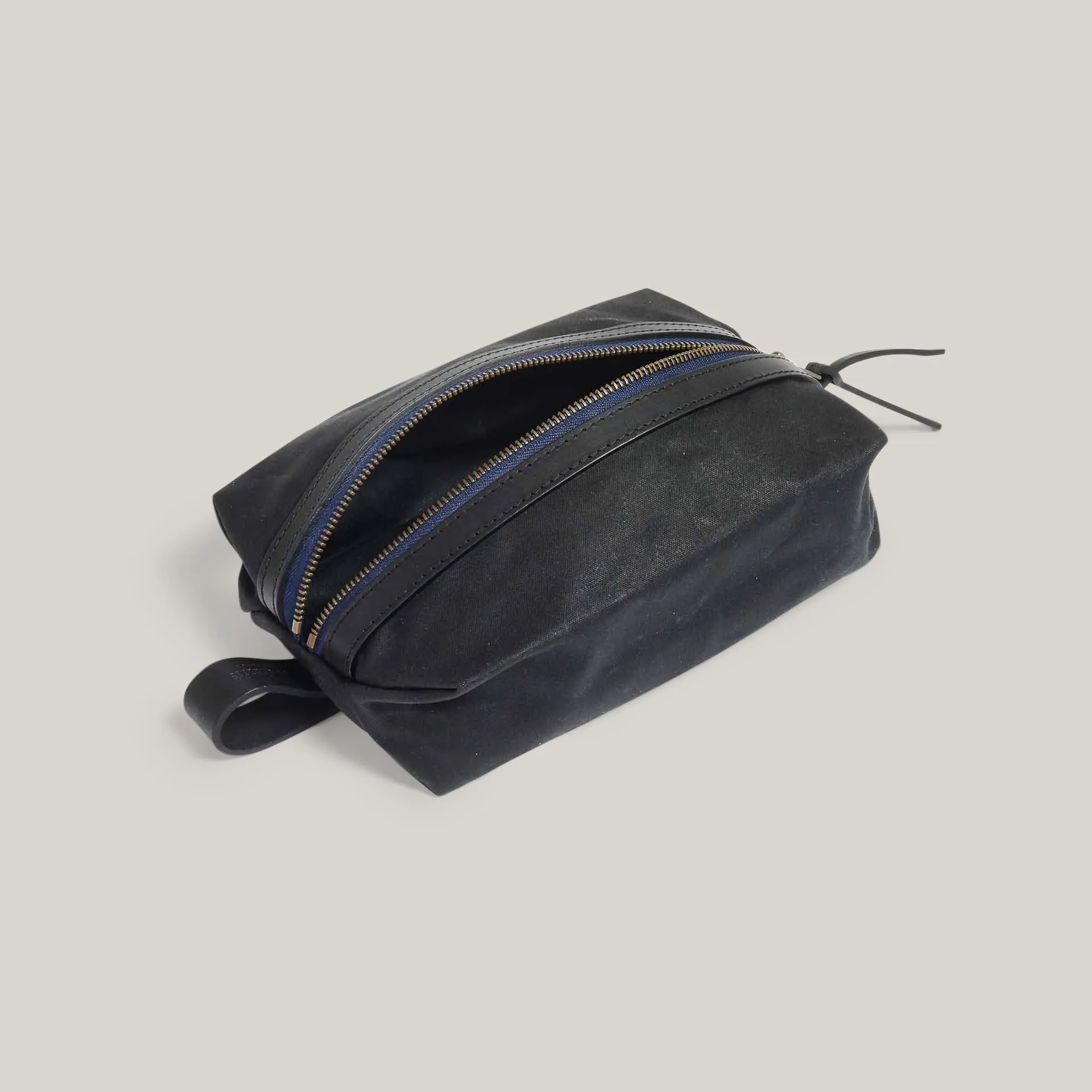 BLEU DE CHAUFFE ZAZOU TOILETRY BAG - BLACK WAX