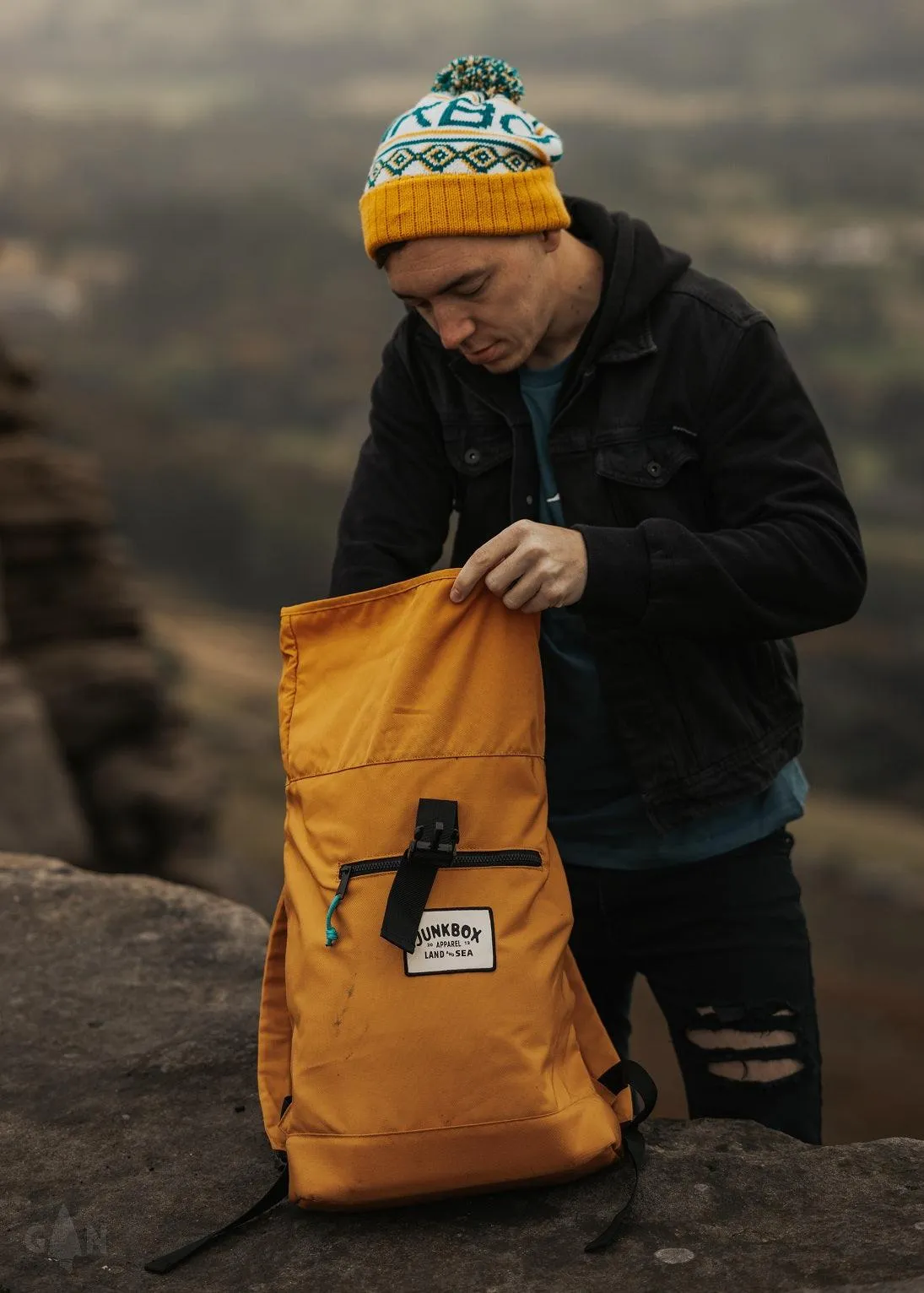 'The Adventurer' Recycled Roll-Top Backpack in Mustard